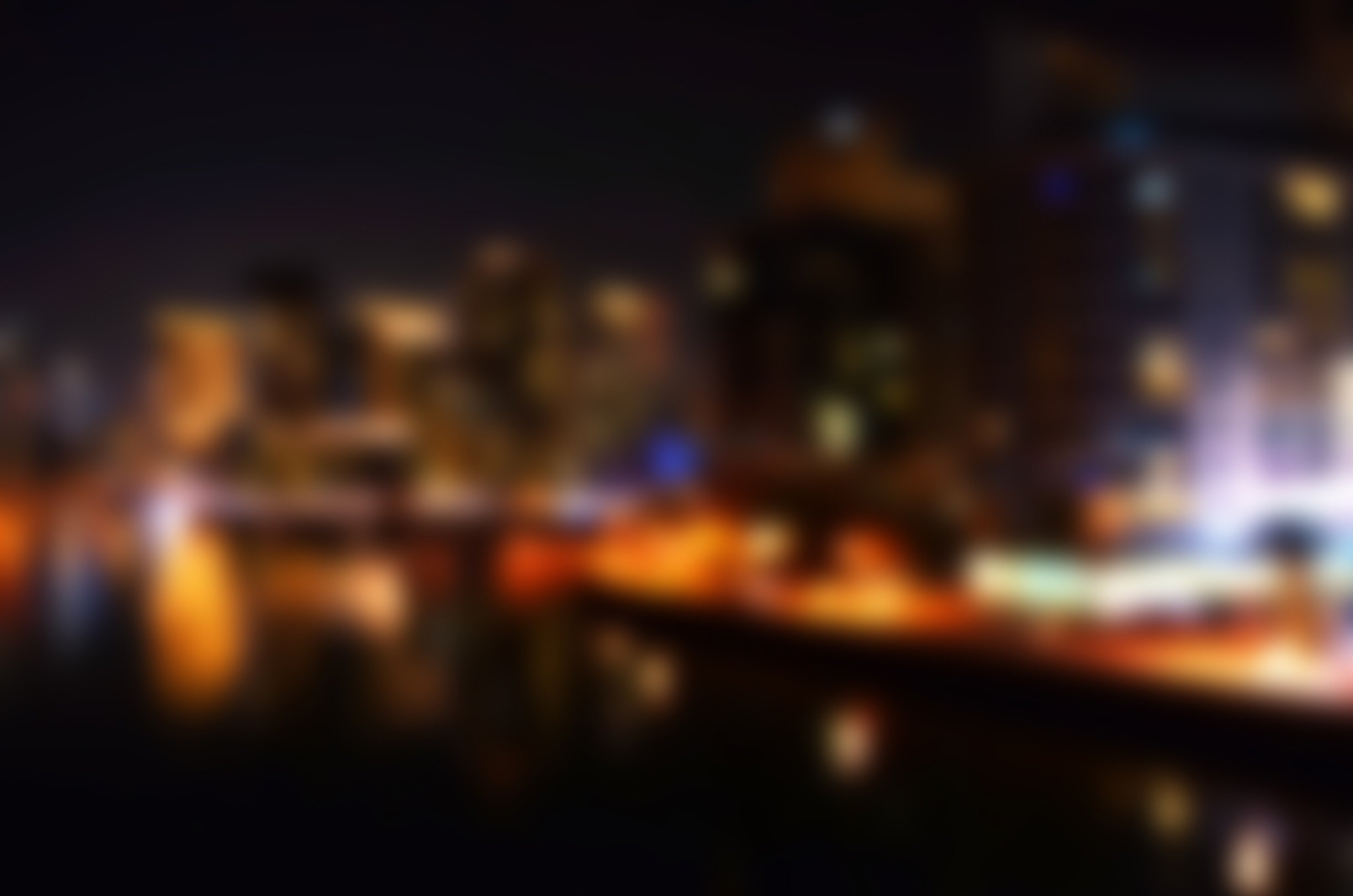 Blurred urban background. Night city